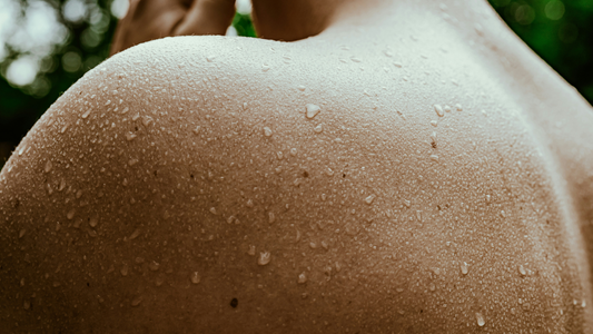 Man profusely sweating after far infrared sauna session.